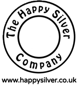The Happy Silver Company logo - handmade sterling silver jewellery from Hampshire, featuring a joyful, rustic design